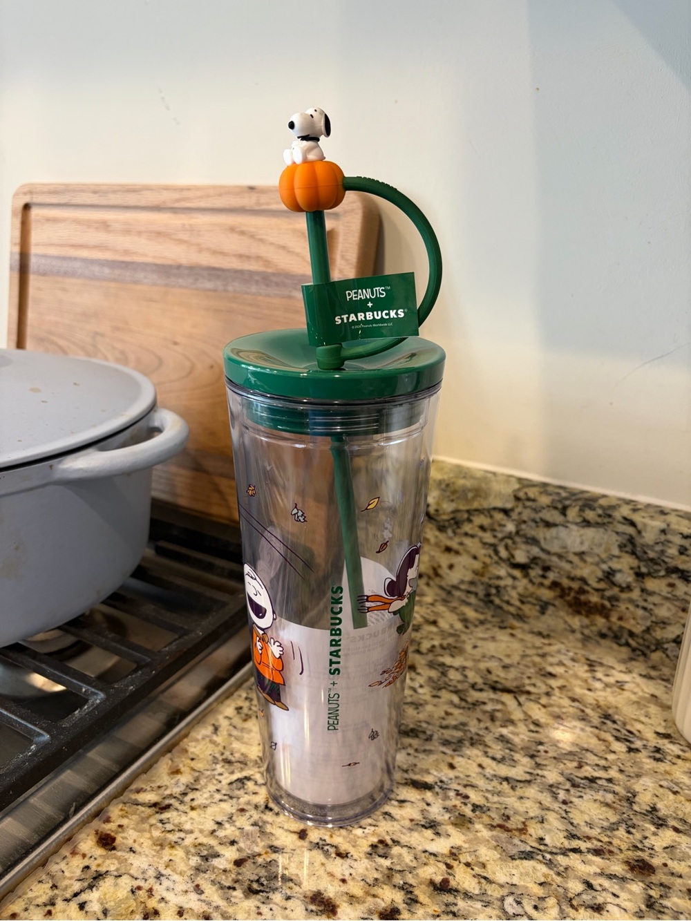 Starbucks Peanuts Tumbler with Green Lid and Orange Pumpkin Topper